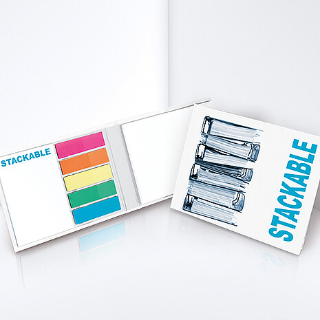 Two white adhesive note pads with five multi-coloured plastic markers in printed hard cover