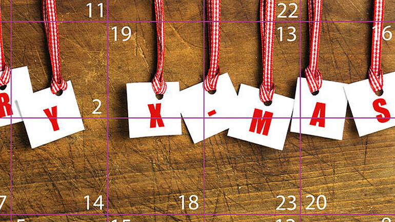 Close-up of the advent calendar’s doors with Christmas design