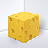 Note cube made from white paper with cheese print
