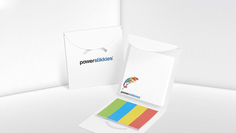 Book with white paper and various paper adhesive markers