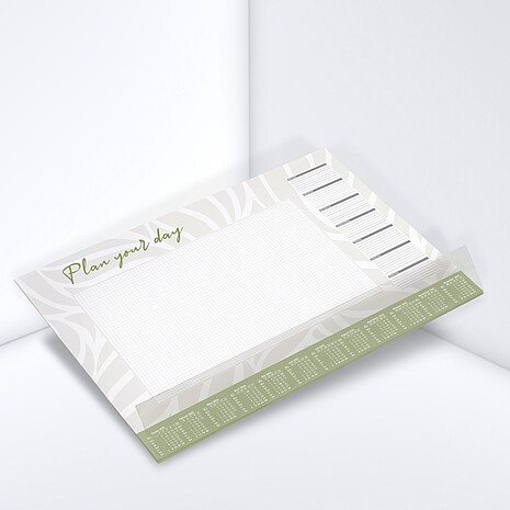 Printed desk pad with calendar design made from white paper with transparent plastic strip