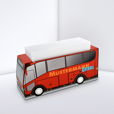 Coach-shaped, printed cardboard box with white notes