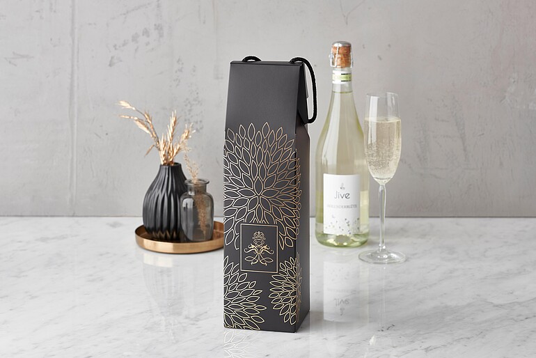 Black carrying bag with gold embossing