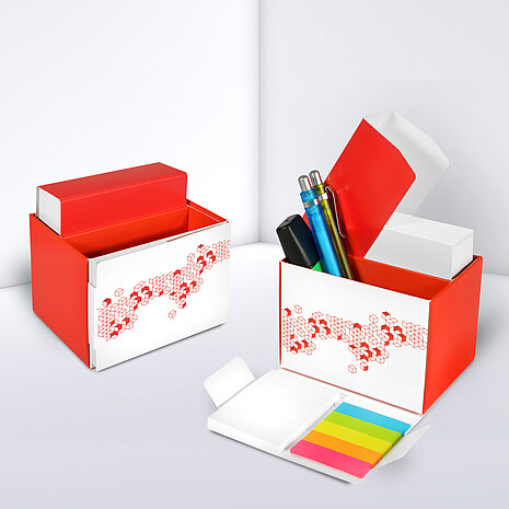 Printed cardboard box with space for office utensils, sheets, adhesive notes and marker set