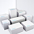 Note cube made from white paper in various sizes