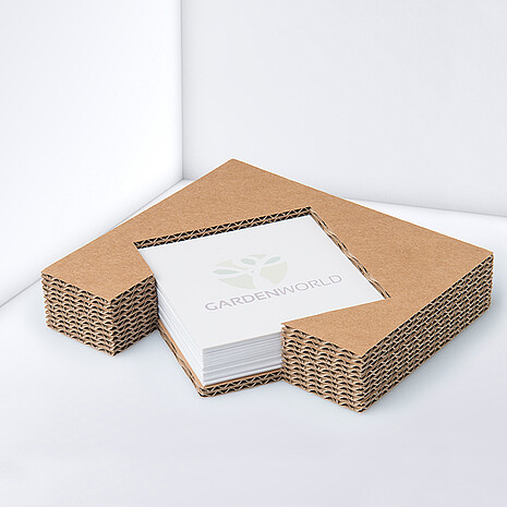 Note holder made from corrugated cardboard with white, square, printed notes