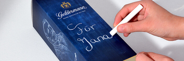 Champagne package with chalk for inscriptions