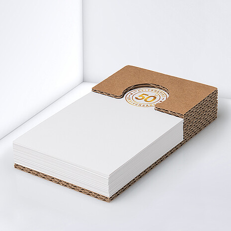 Note holder made from corrugated cardboard with white, rectangular, printed notes